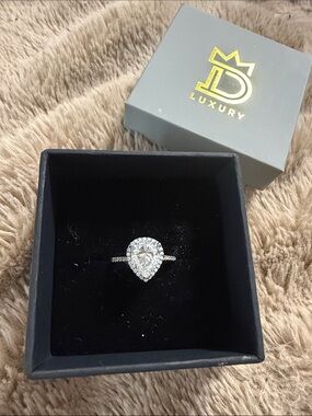Moissanite (Diamond Alt.) 2 CT Pear Halo Engagement Ring in Silver Pave Band